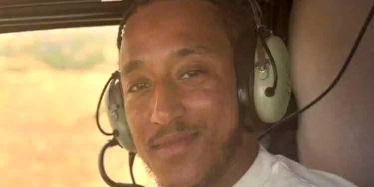 Man, 26 gunned down while sat in car is pictured as family pay heartbreaking tribute to 'funny & honest' son