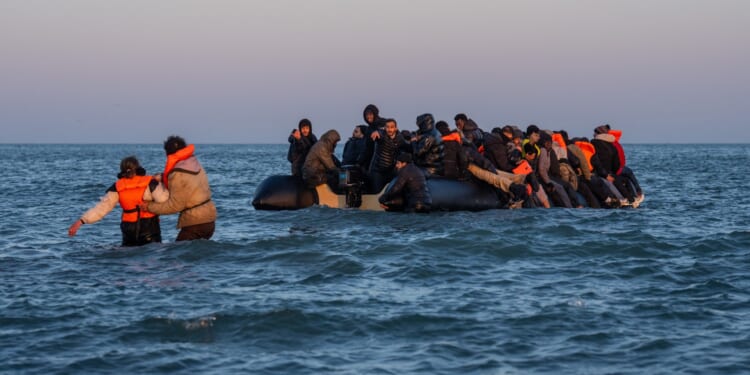 Labour MP sparks fury with call to give thousands of migrants permanent residency so they can claim benefits