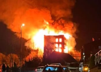 Flames appeared to decimate the interior of the seven-storey building on Mill Street, with fire crews rushing to the scene to try tackle the blaze