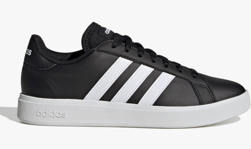 Adidas black court trainers with white stripes.