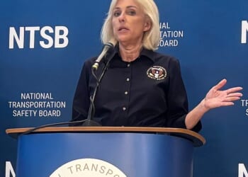 The air traffic controller who sent a fire truck into the path of the Air Canada plane at LaGuardia Airport on Sunday was 'still on duty for several minutes' after the crash, NTSB boss Jennifer Homendy said at a press conference Tuesday (pictured)