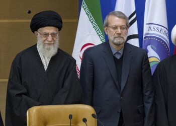 Iran's Supreme Leader Ayatollah Ali Khamenei (left) died in joint US and Israeli strikes in Tehran in the early hours of Saturday. He is pictured here with Ali Larijani (right) - who has largely taken control of Iran