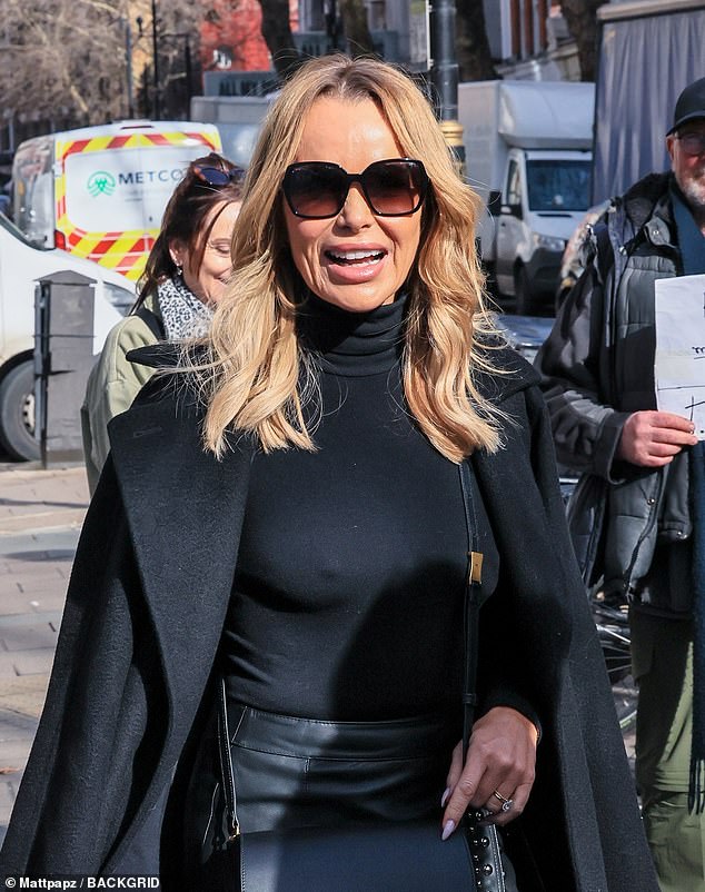 The BGT judge set pulses racing as she went braless beneath a tight black sweater which she wore with a studded leather mini skirt