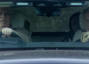 Andrew Mountbatten-Windsor has been spotted visiting his new home with his bodyguard, dog and a mystery woman in the rear of his 4x4 behind the passenger seat