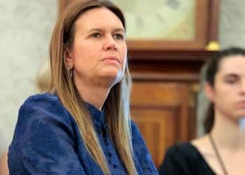 Arkansas Gov. Sarah Huckabee Sanders attends an event on natural disaster preparedness with President Donald Trump in the Oval Office at the White House on June 10, 2025, in Washington, D.C.