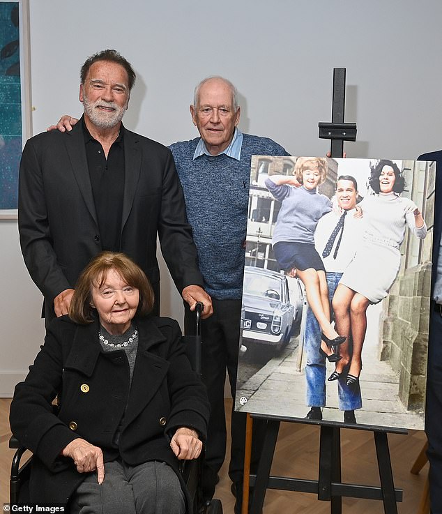 The 78-year-old Austrian and American star's first trip to the Northern Ireland capital was in 1966, when he competed in his first bodybuilding competition at age 19; pictured with Sandra Weird and photographer Roy Smith, who photographed them in 1966