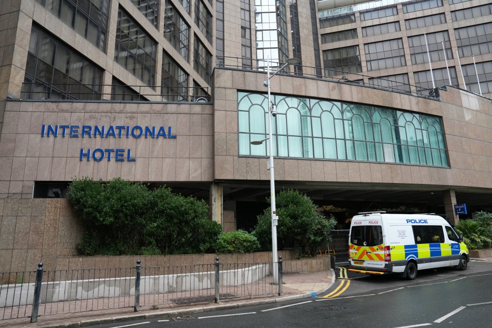 Police van securing the entrance of the Britannia International Hotel in Canary Wharf.