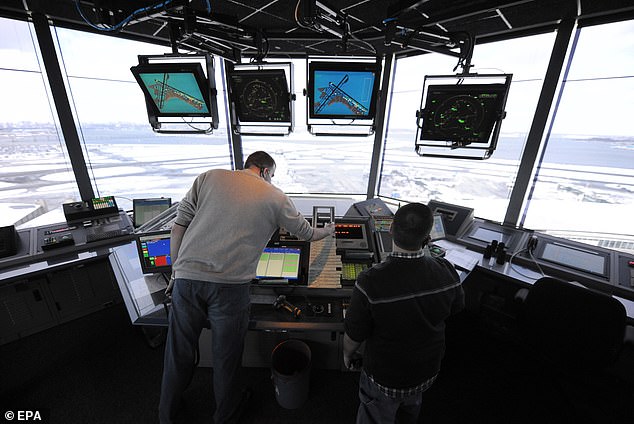 It remains unclear whether it was the same air traffic controller that gave both the Air Canada plane and the firetruck the go-ahead to proceed to the runway. LaGuardia's air traffic control tower is pictured in 2011