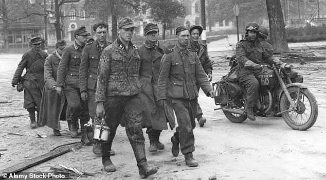 German troops being marched out of Arnhem after liberation by the Allied forces