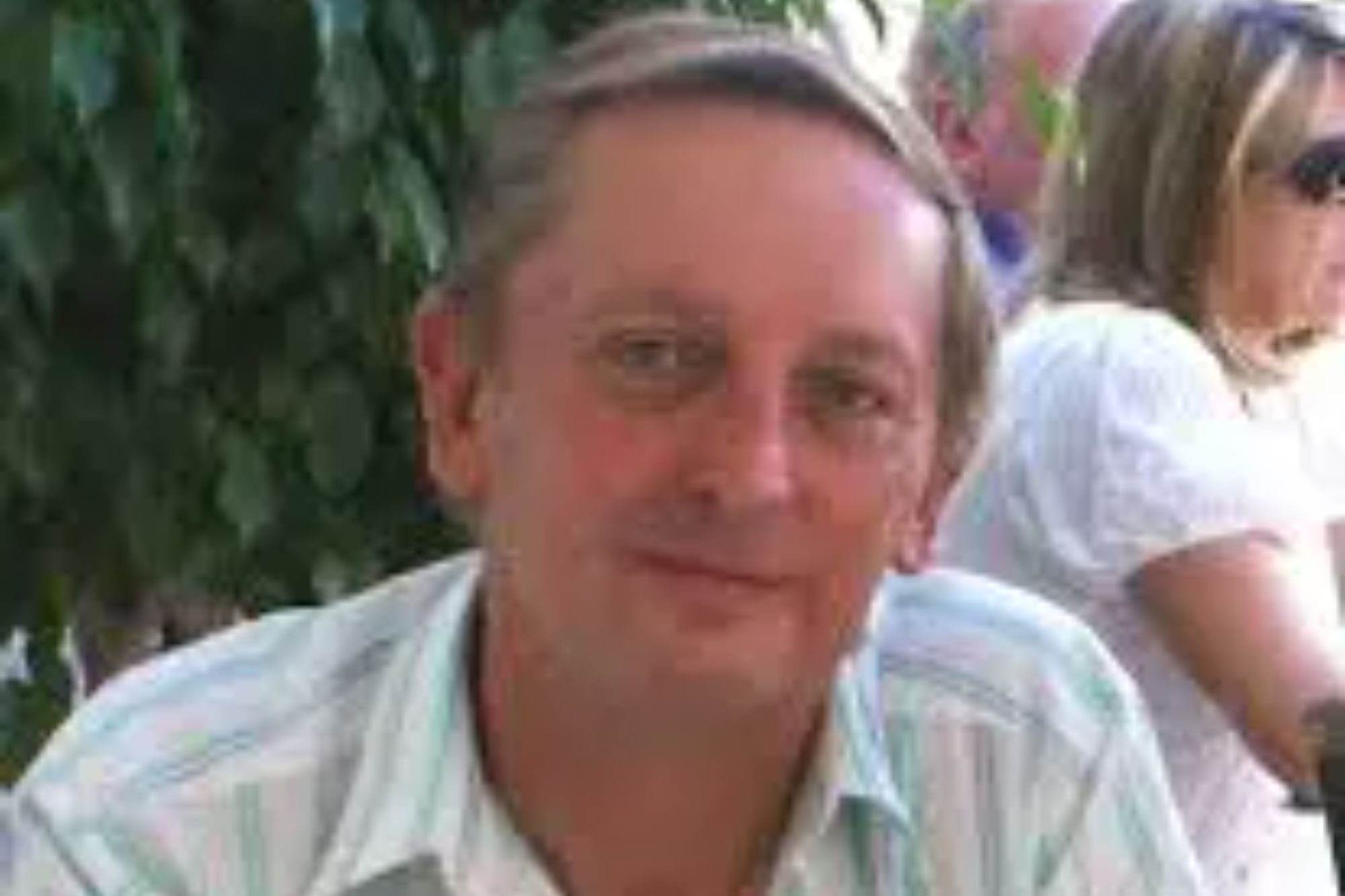 An image collage containing 1 images, Image 1 shows A man with short blonde hair and a striped shirt smiles at the camera