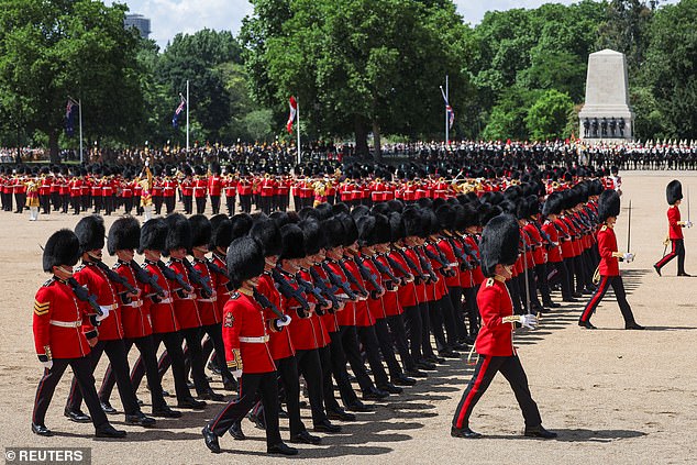 Members of the King's Guard take part in the Trooping the Colour parade which honours King Charles on his official birthday, in London, on June 14, 2025