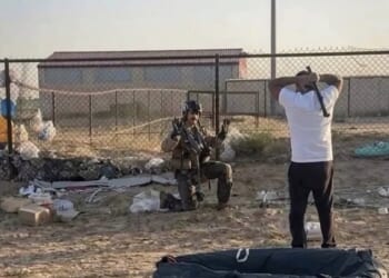 Footage on social media shows a group of men approaching the pilot and shouting, while one of them brandishes a metal pipe