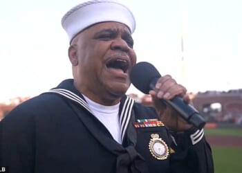 Baseball fans were left with 'goosebumps' after a stirring rendition of the national anthem