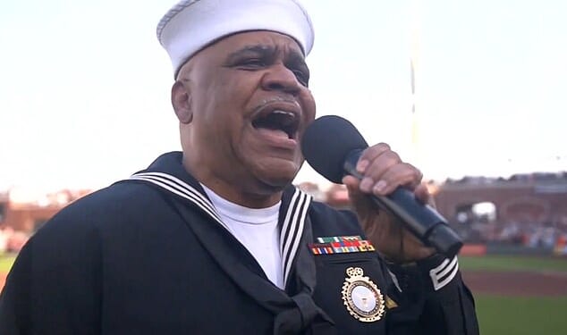 Baseball fans were left with 'goosebumps' after a stirring rendition of the national anthem