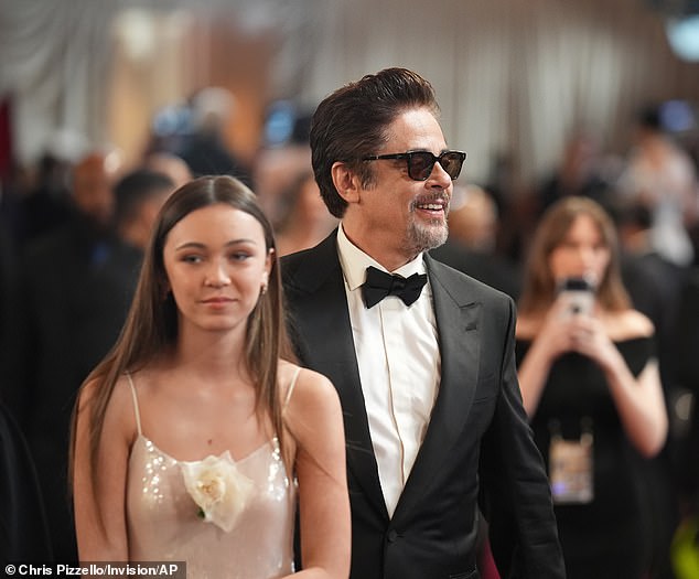The 59-year-old star couldn¿t hide his pride as he escorted 14-year-old Delilah, his child with ex Kimberly Stewart, down the Shrine Auditorium red carpet.