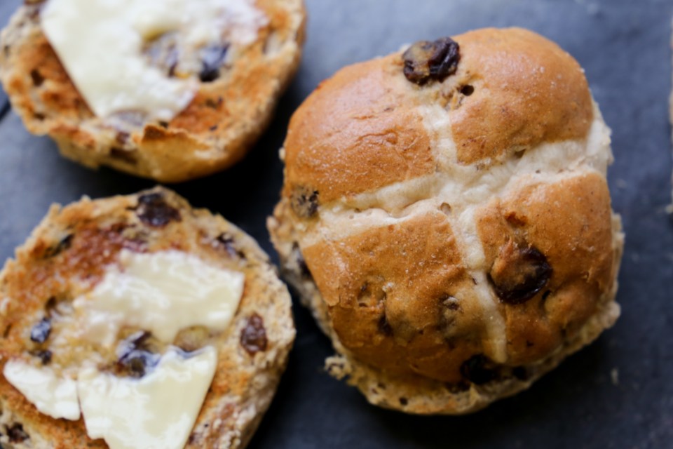 Buttered hot cross buns.