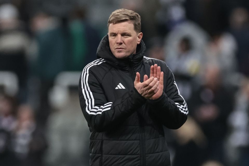 Newcastle United manager Eddie Howe applauds fans.