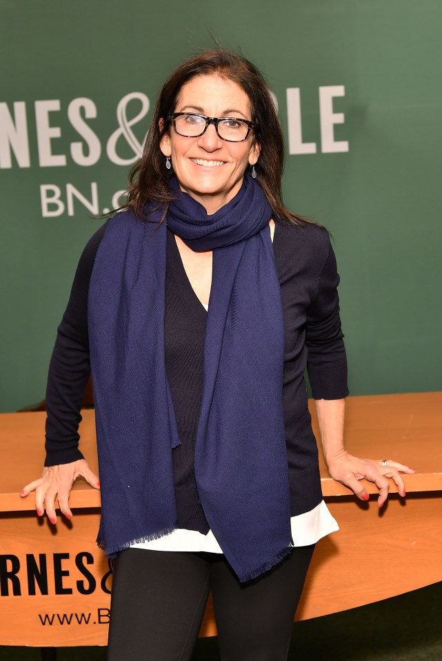Makeup artist Bobbi Brown smiles at a book signing.