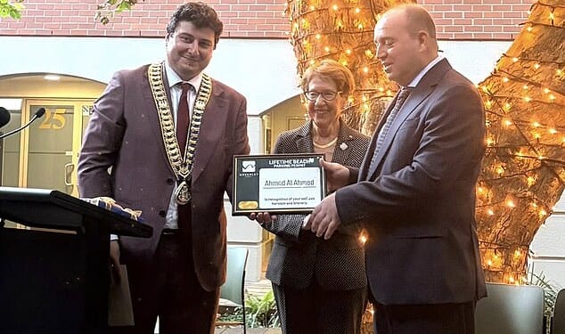 Ahmed Al Ahmed (right0 was presented with a Key to the City and a lifetime Waverley Beach Pass in recognition of his bravery during the December 14 shooting
