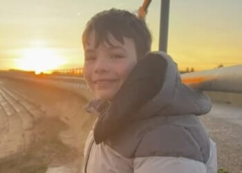 Boy, 13, killed after being hit by car while riding scooter is pictured as family pay touching tribute & 2 arrested