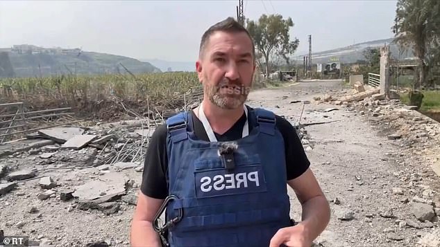 British journalist Steve Sweeney is seen moments before a missile struck the ground just feet behind him in southern Lebanon