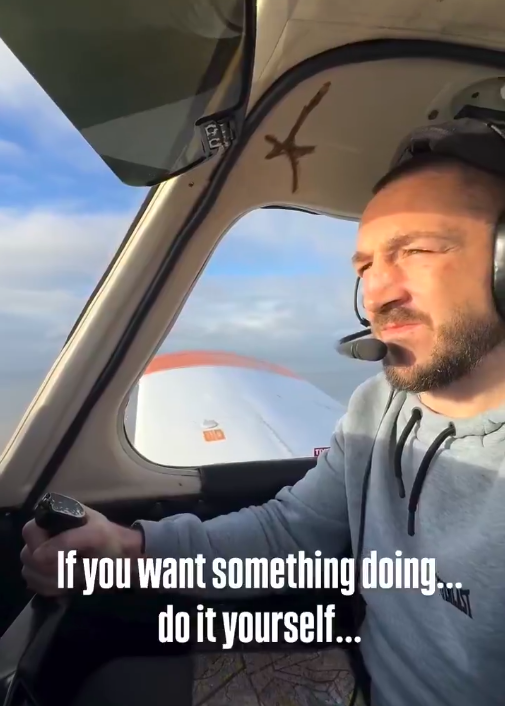 A pilot in a small airplane with the text "If you want something doing...do it yourself..."