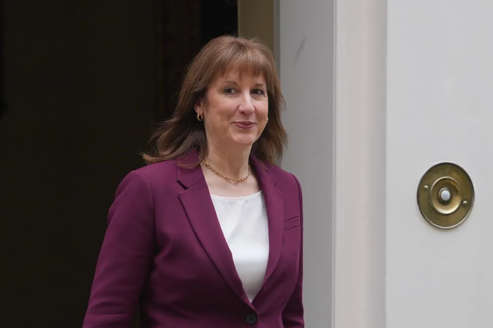 Rachel Reeves, Britain's Chancellor of the Exchequer, smiles while leaving 11 Downing Street.