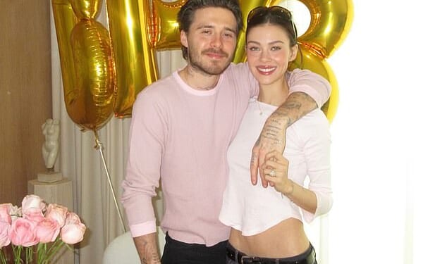 Brooklyn Beckham is said to have been 'disheartened' that his parents publicly wished him a happy birthday and broke their communication agreement (pictured with Nicola Peltz)