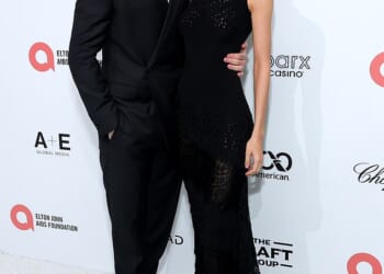 Hours after his brutal Mother's Day snub, Brooklyn Beckham cut a carefree figure as he joined his wife Nicola Peltz for his godfather Elton John's Oscars viewing party on Sunday