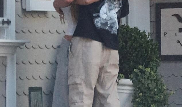 Brooks Nader absolutely devoured her new love Taron Egerton during a public make out session in Santa Monica on Sunday