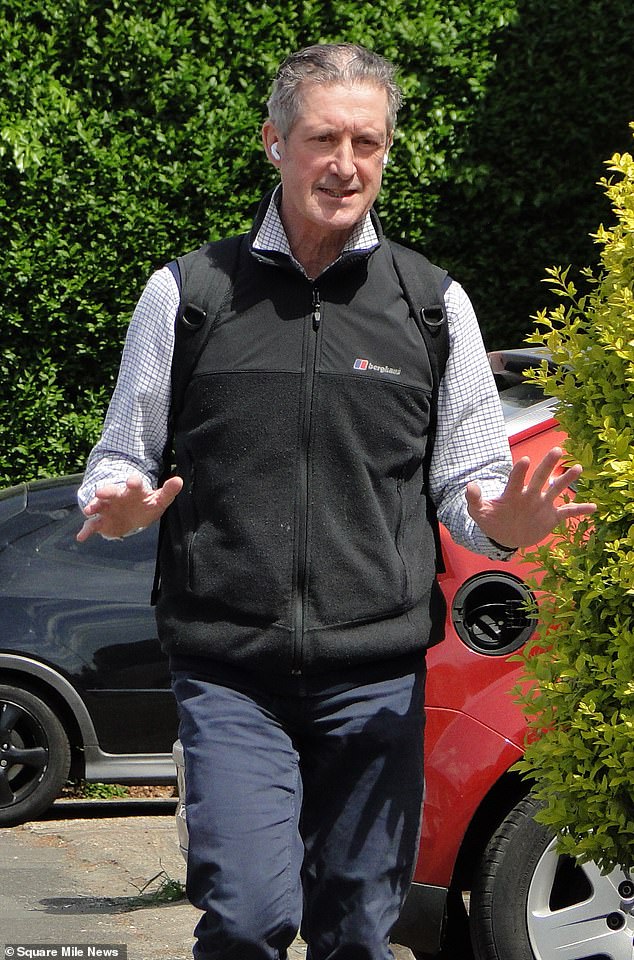 Robin Christie, 65, is pictured leaving Wimbledon Magistrates' Court - he has been convicted of harassment after a row with neighbours over their planning application but has been spared jail time