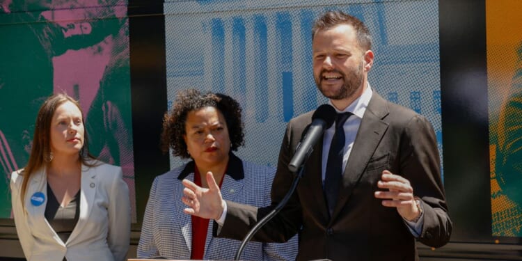 California Assemblyman Matt Haney speaks at a "Just Majority" nationwide bus tour news conference to call for reforms to the U.S. Supreme Court on May 16, 2023, in Sacramento, California.
