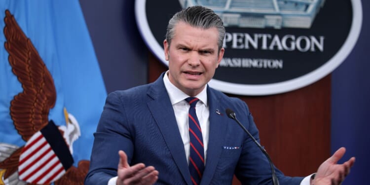 U.S. Secretary of War Pete Hegseth speaks during a news conference at the Pentagon in Arlington, Virginia, on March 2, 2026.