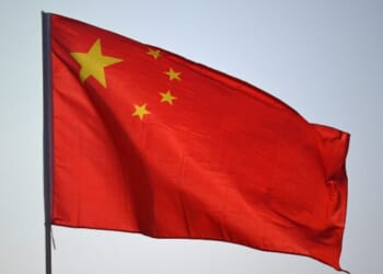 Chinese flag waves in Nanning, China on October 15, 2025.