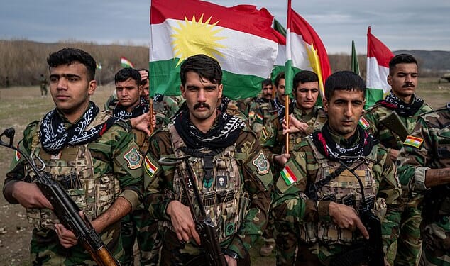 Kurdish Peshmerga fighters train on January 18, 2026 near Erbil, Iraq