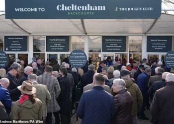 Racegoers at the entrance on day one of the 2026 Cheltenham Festival at Cheltenham Racecourse. Picture date: Tuesday March 10, 2026. PA Photo. Photo credit should read: Andrew Matthews/PA Wire.RESTRICTIONS: Use subject to restrictions. Editorial use only, no commercial use without prior consent from rights holder.