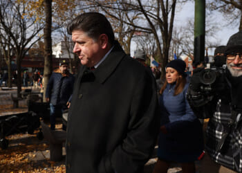 Illinois Governor J.B. Pritzker walks at Veterans Day ceremony in Little Village on November 11, 2025.