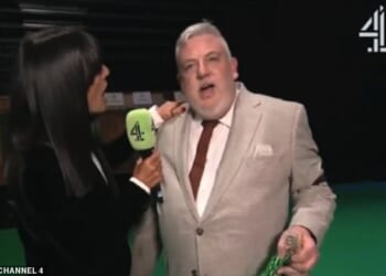 Claudia Winkleman was accidentally hit in the face by Crufts winner Lee Cox in an awkward mishap following his dog Bruin winning Best in Show on Sunday