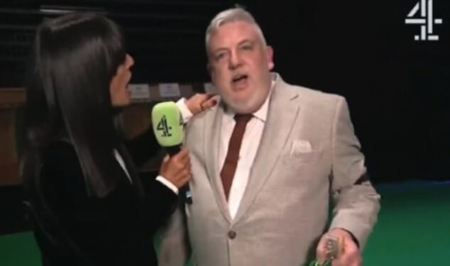 Claudia Winkleman was accidentally hit in the face by Crufts winner Lee Cox in an awkward mishap following his dog Bruin winning Best in Show on Sunday