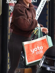 Coleen Rooney has been spotted without her wedding ring after husband Wayne boozes with two mystery women