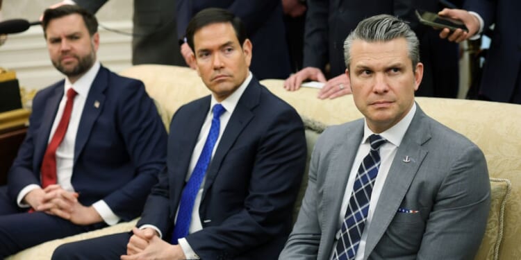 Vice President J.D. Vance, Secretary of State Marco Rubio, and Secretary of War Pete Hegseth look on during a bilateral meeting with President Donald Trump and German Chancellor Friedrich Merz in the Oval Office of the White House on March 3, 2026, in Washington, D.C.