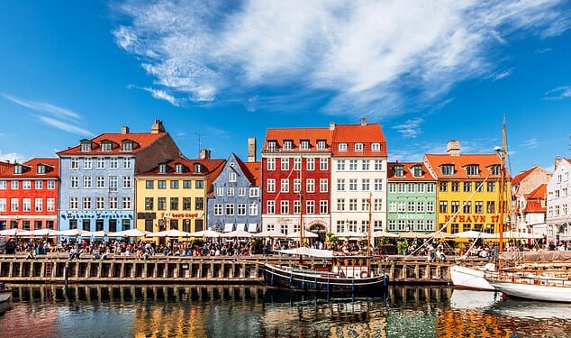 Day one of the bumper weekend trip began in Copenhagen. Pictured: the pretty, colourful houses at Nyhavn in the Danish capital