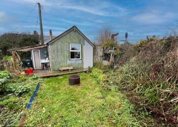 The shed where Catrina Davies has been living and the surrounding land have an auction guide price of £80,000 to £100,000