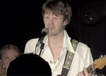 Cruz Beckham struggled to hold back tears while performing a song inspired his older brother's continuing family estrangement on Tuesday evening