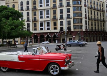 A classic American car is seen parked near the Iberostar Parque Central hotel in Havana on March 12, 2026.