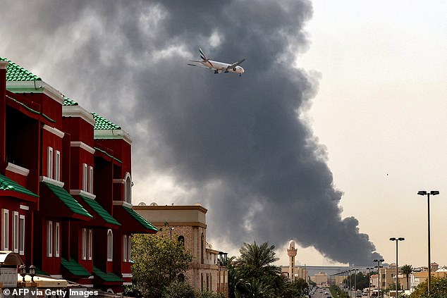 An Emirates plane prepares to land at Dubai Airport on March 16 following a drone strike