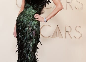 Demi Moore has been brutally roasted over her bizarre feathered frock at the 2026 Oscars... as she sparked fresh concern over her frail frame