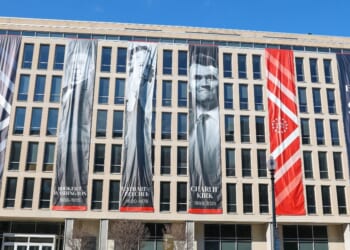 A banner with Charlie Kirk's image is seen on the outside of the Department of Education headquarters on March 1, 2026, in Washington, D.C.