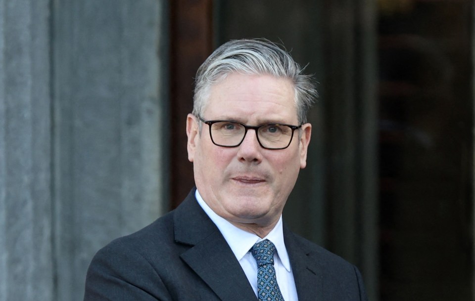Britain's Prime Minister Keir Starmer shaking hands with his Irish counterpart Michael Martin.