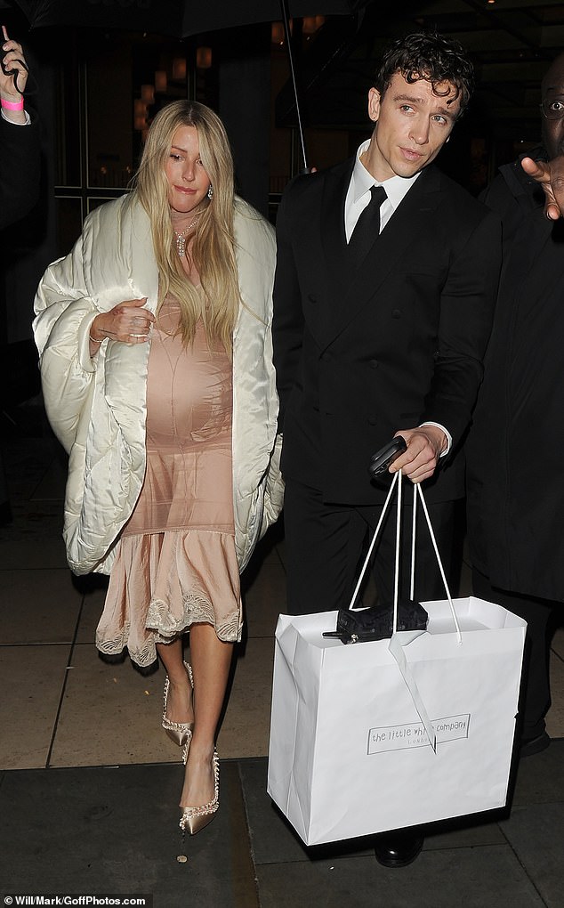 The singer revealed last week she's welcomed a baby girl named Iris with her boyfriend Beau Minniear (pictured last month)